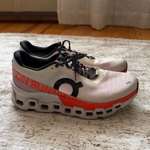 On Running White and Red Athletic Sneakers